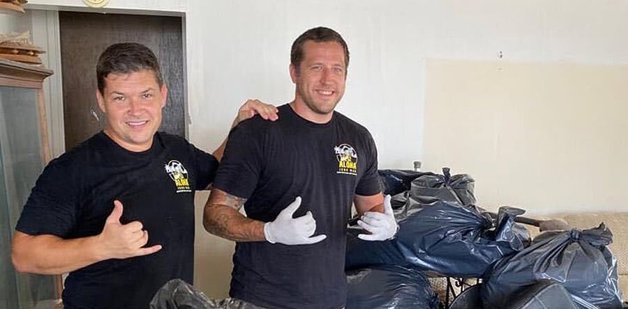 Aloha Junk Man employees removing junks