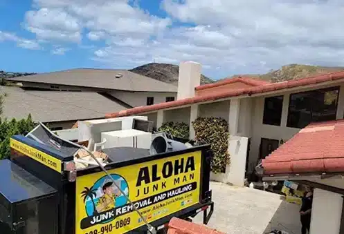 Aloha Junk Man truck providing estate cleanout services at an Oahu home