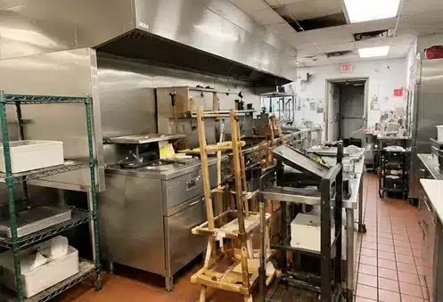Commercial kitchen equipment prepared for restaurant cleanout