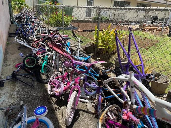 Large pile of unwanted bicycles prepared for professional junk removal
